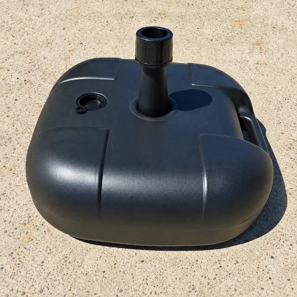 Fillable water base with a central feather flagpole holder