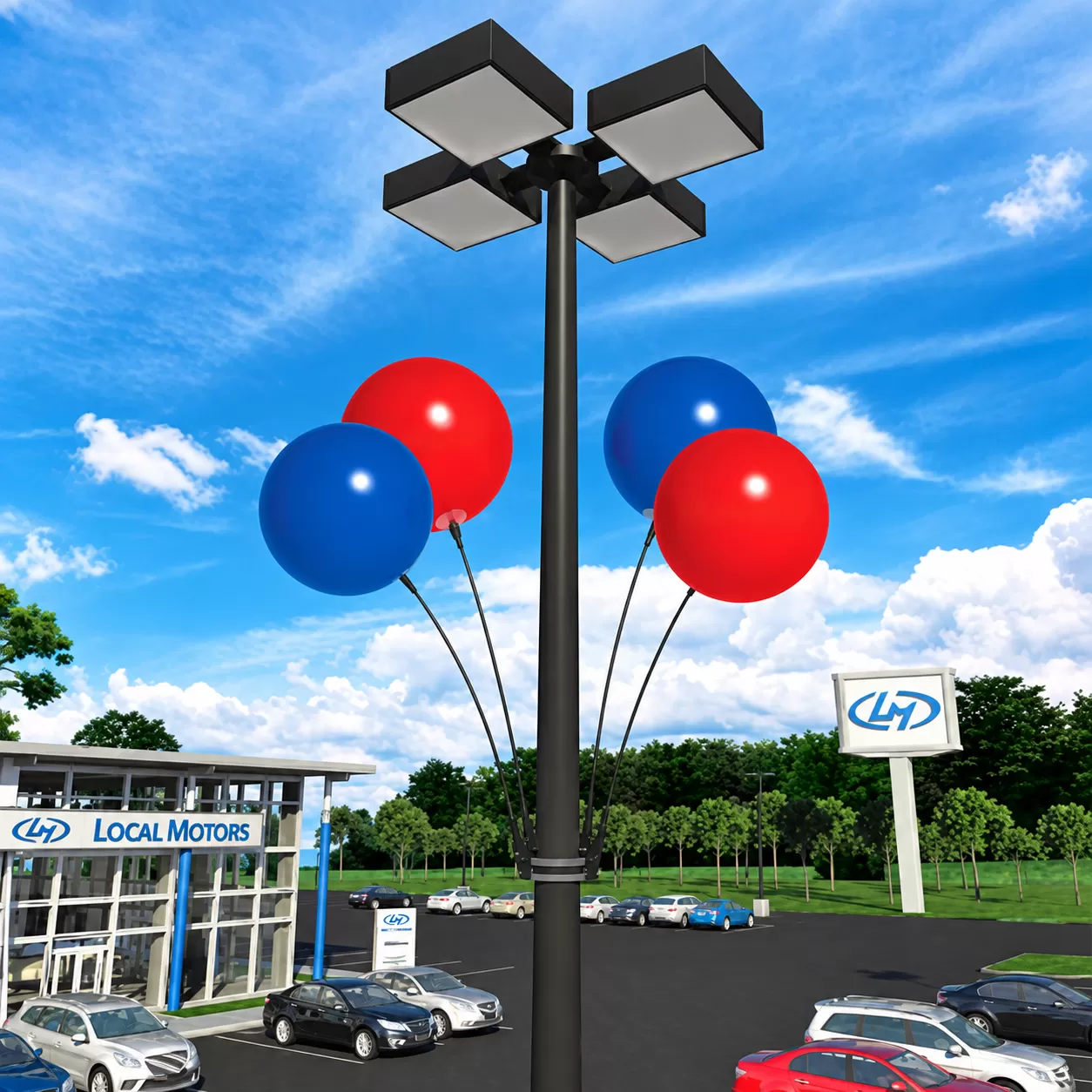 Four red and blue DuraBalloons mounted around a parking lot light pole