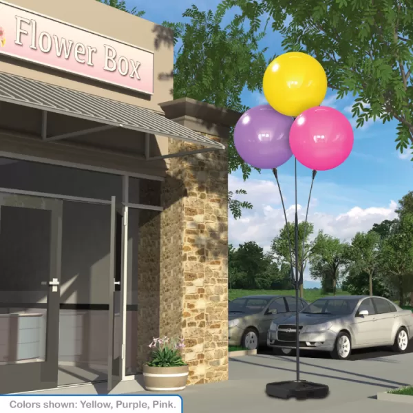 Three DuraBalloons on a weighted-base cluster pole outside a shop