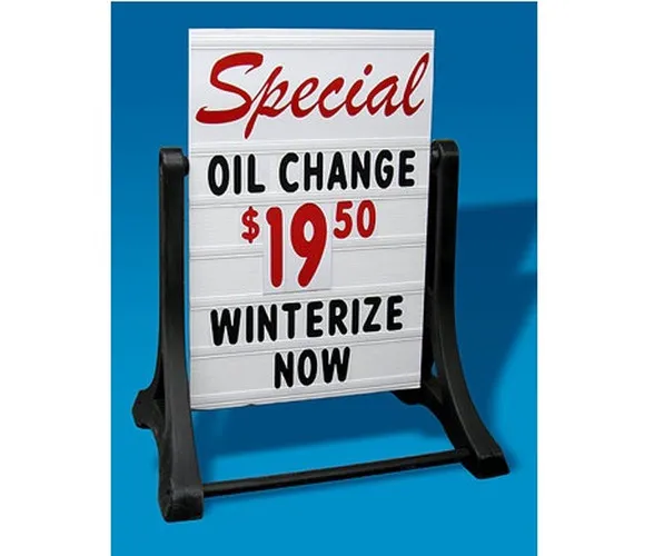 Deluxe Swinger sidewalk sign displaying an oil change special