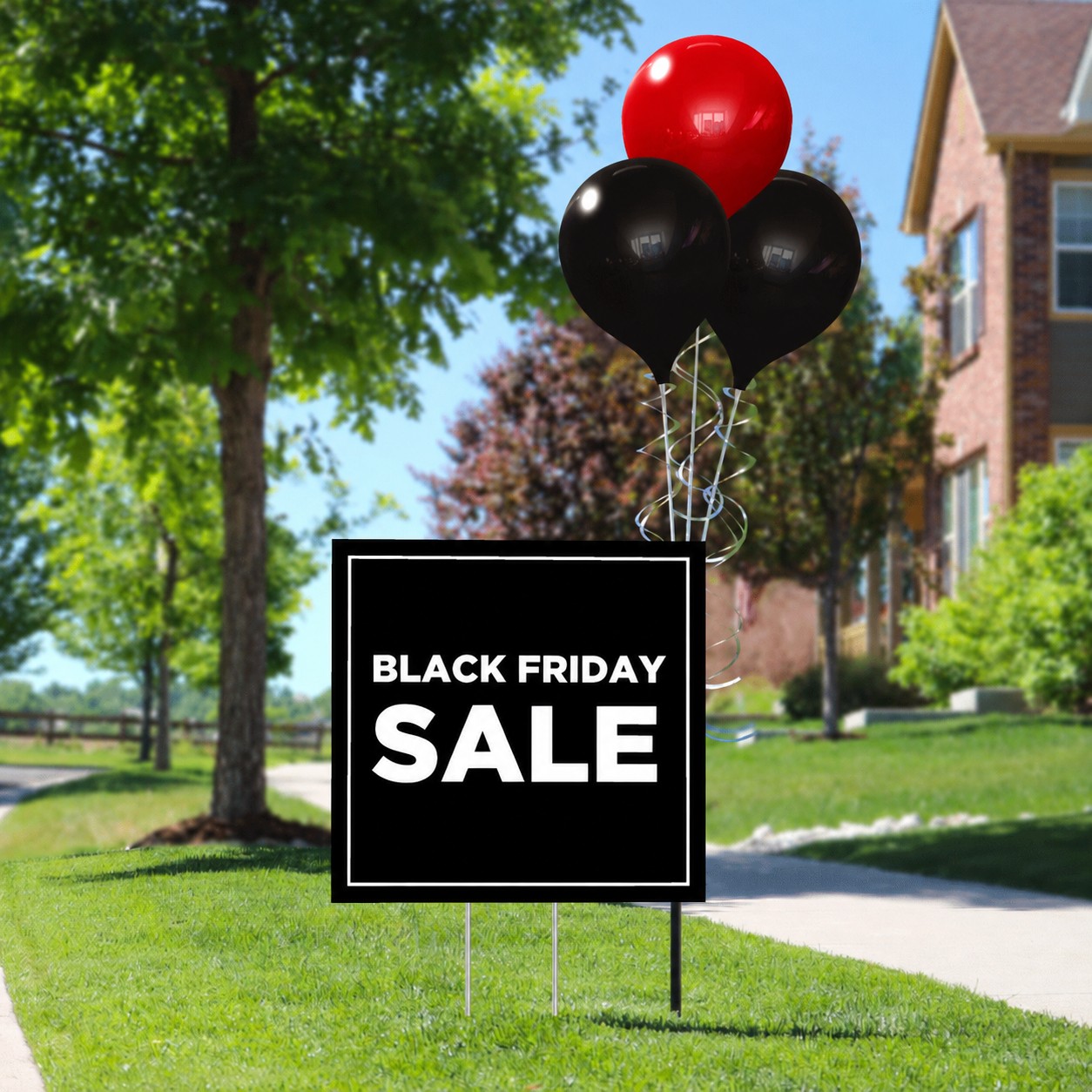 Black Friday SALE yard sign with one red and two black PermaShine balloons on a ground-pole display