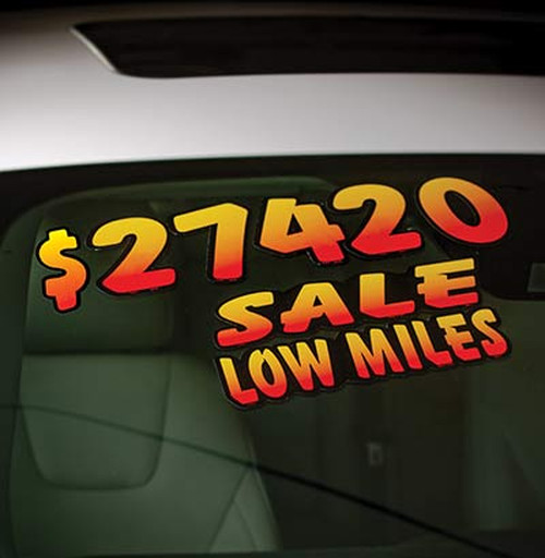 Tequila Sunrise yellow-to-red price numbers on a vehicle windshield, shown with separate SALE and LOW MILES slogan decals