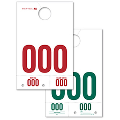 Long white service dispatch tags showing red front and green back numbering