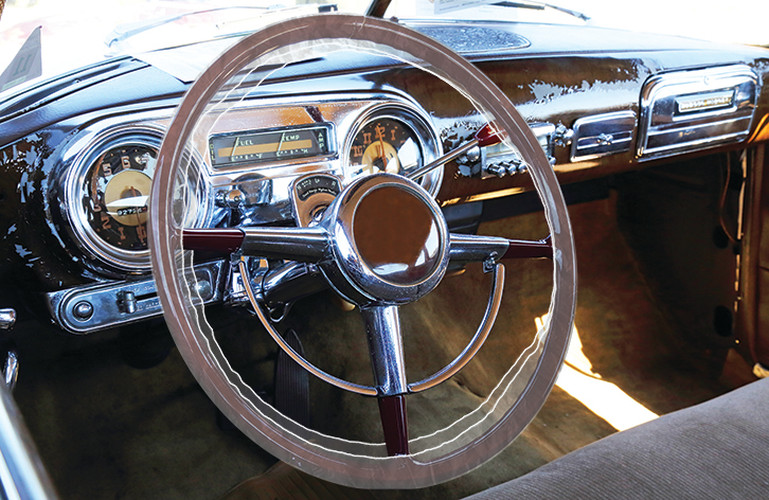 Extra-large double-elastic cover protecting an oversized steering wheel rim