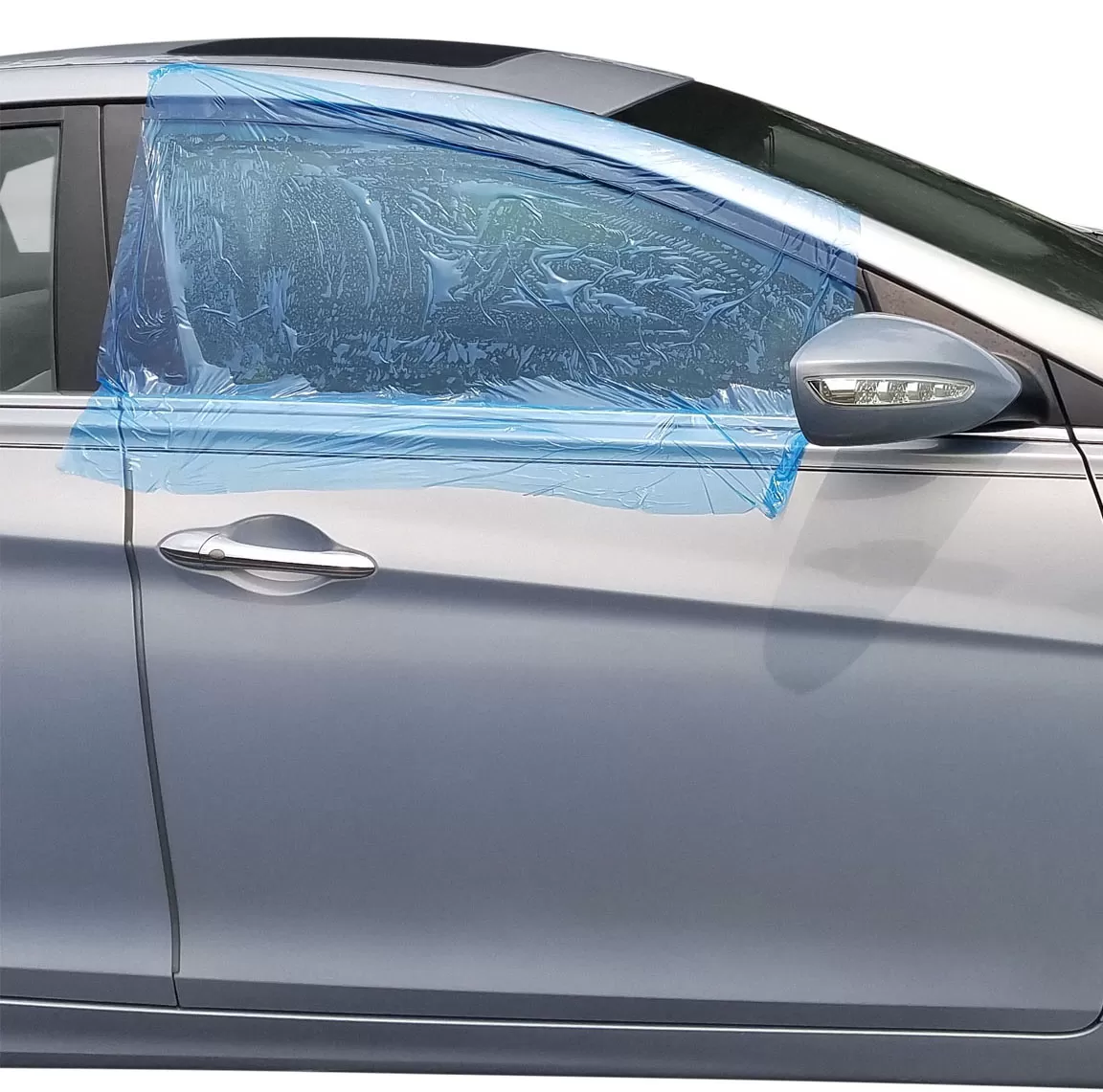 Blue-tinted collision wrap covering the front side window of a silver car
