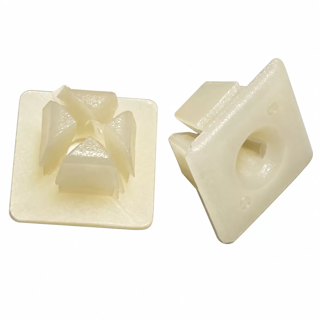 Two cream-colored nylon license plate inserts showing front and side views
